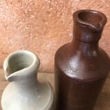 Duo of small stoneware bottles
