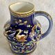 Old cream jug Gien Renaissance blue background 1938/1960