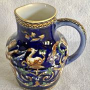 Old cream jug Gien Renaissance blue background 1938/1960