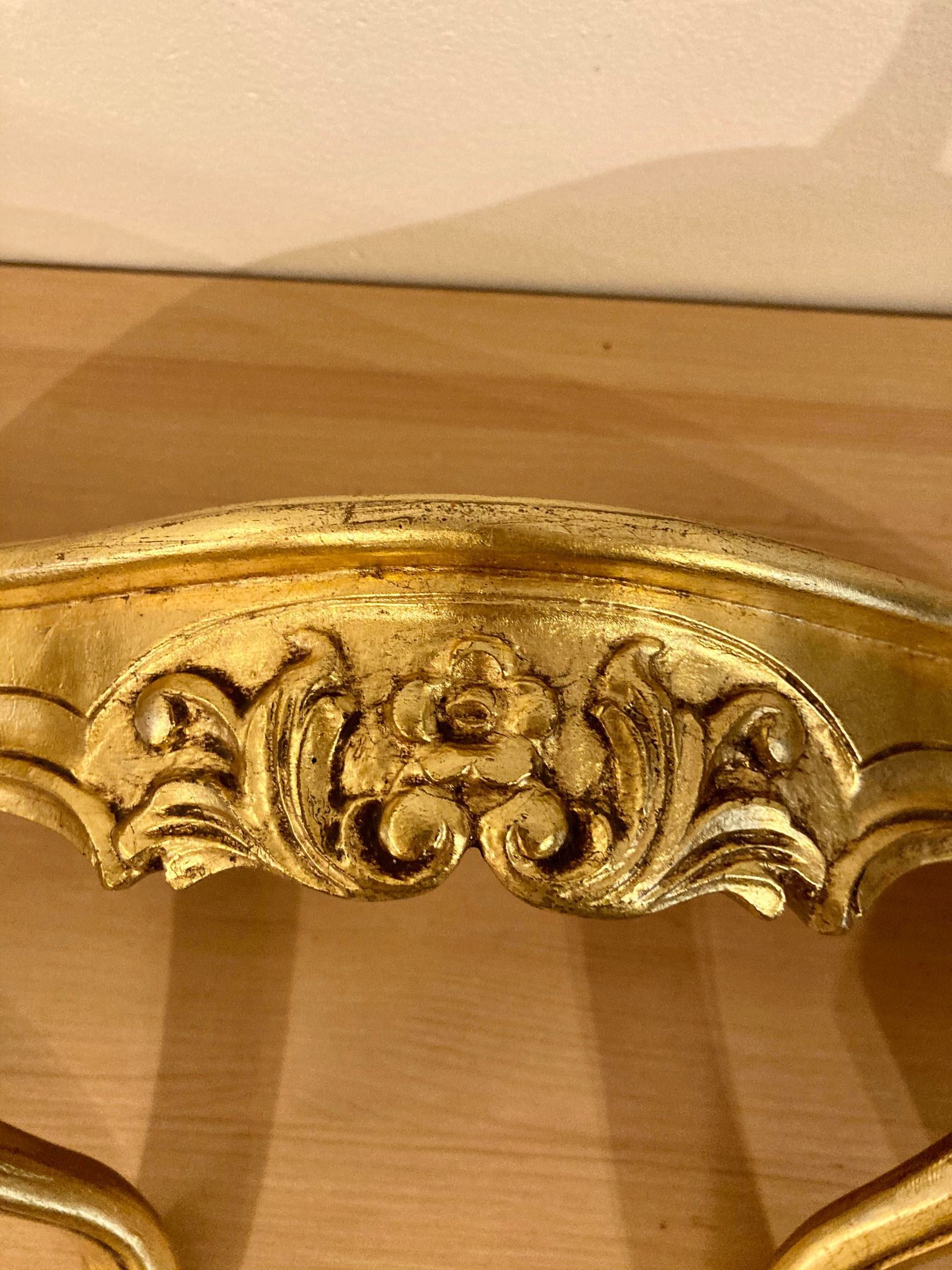 Pair of gilded wall shelves