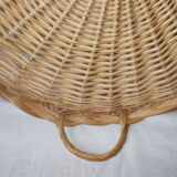 Round wicker dish with handles
