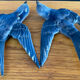 Old pair of porcelain birds for wall decoration.