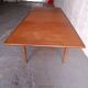 Scandinavian type table with integrated extension