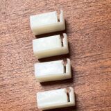 Minimalist white German mid-century coat rack with strings from the 1960s.