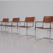 4 fauteuils cantilever Matteo Grassi en cuir cognac
