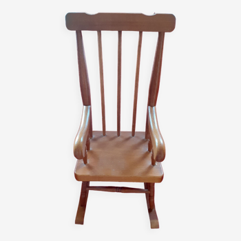 Toy wooden rocking chair.