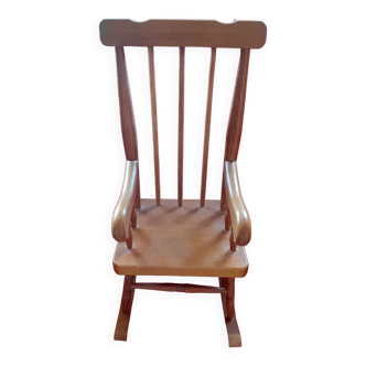 Toy wooden rocking chair.