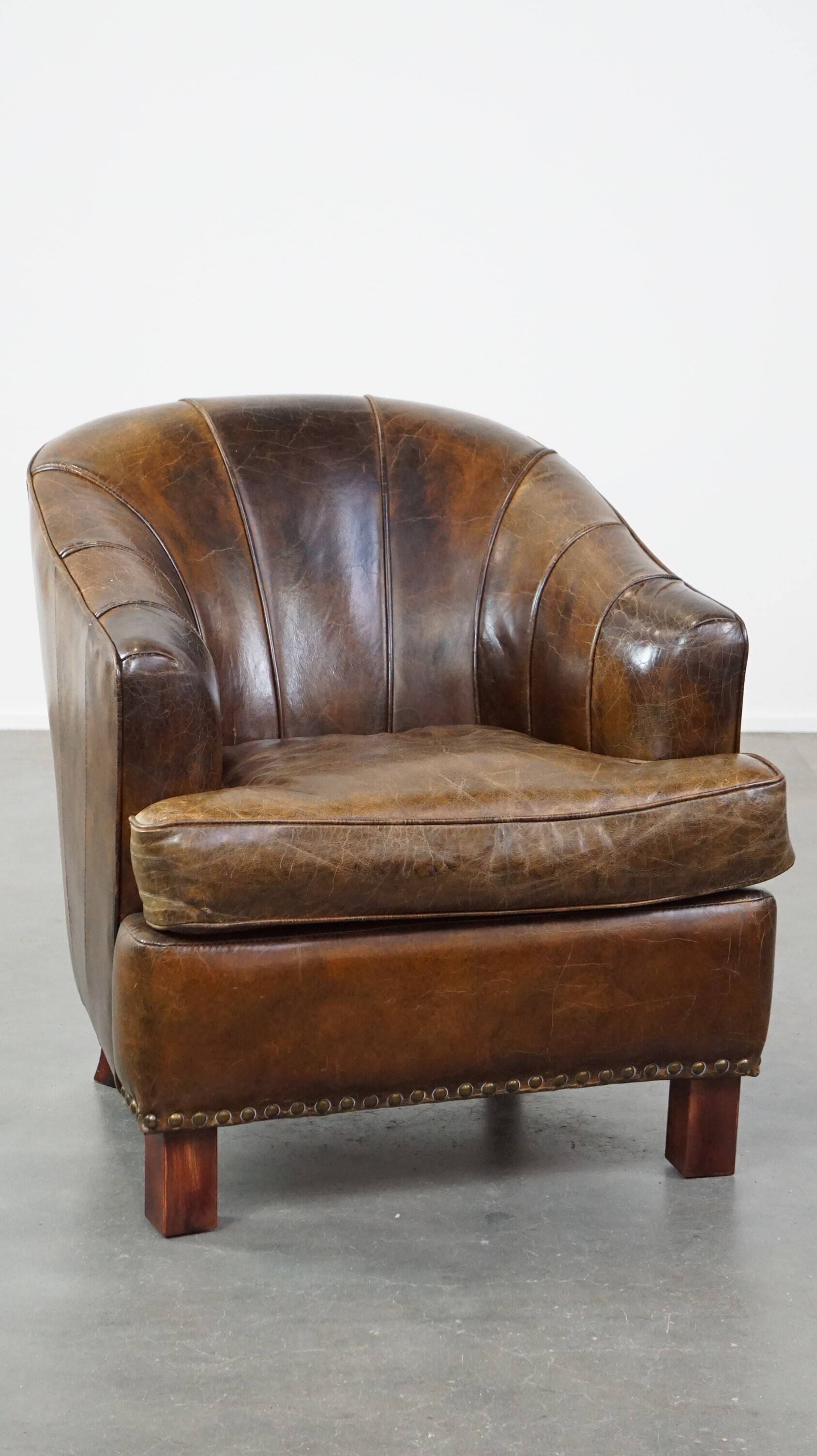 Stylish armchair with a unique design and beautiful finish, made of leather