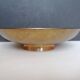 Enamelled brass stand with floral decoration.