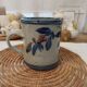 Speckled enamelled stoneware jug signed Christine Robert