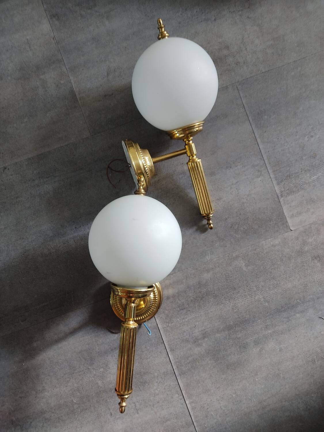Pair of Art Deco style wall lights in brass and milk glass Sölken Leuch