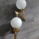 Pair of Art Deco style wall lights in brass and milk glass Sölken Leuch