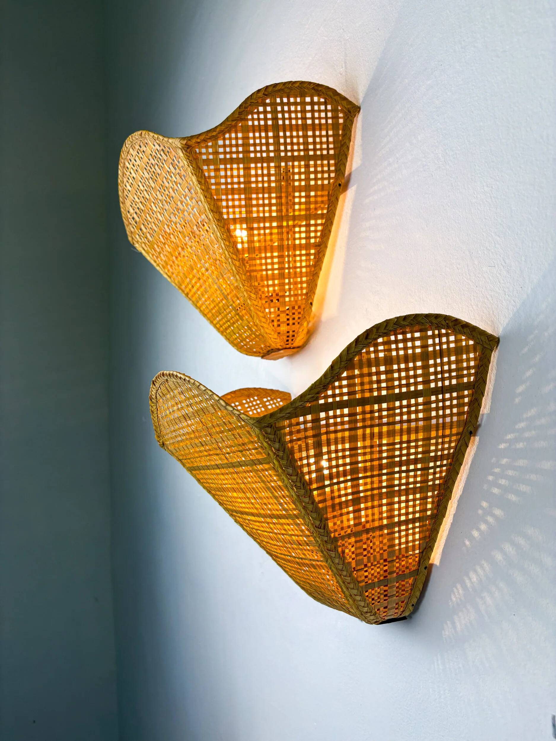 Pair of scalloped rattan wall sconces, sourced in Spain, 1980s