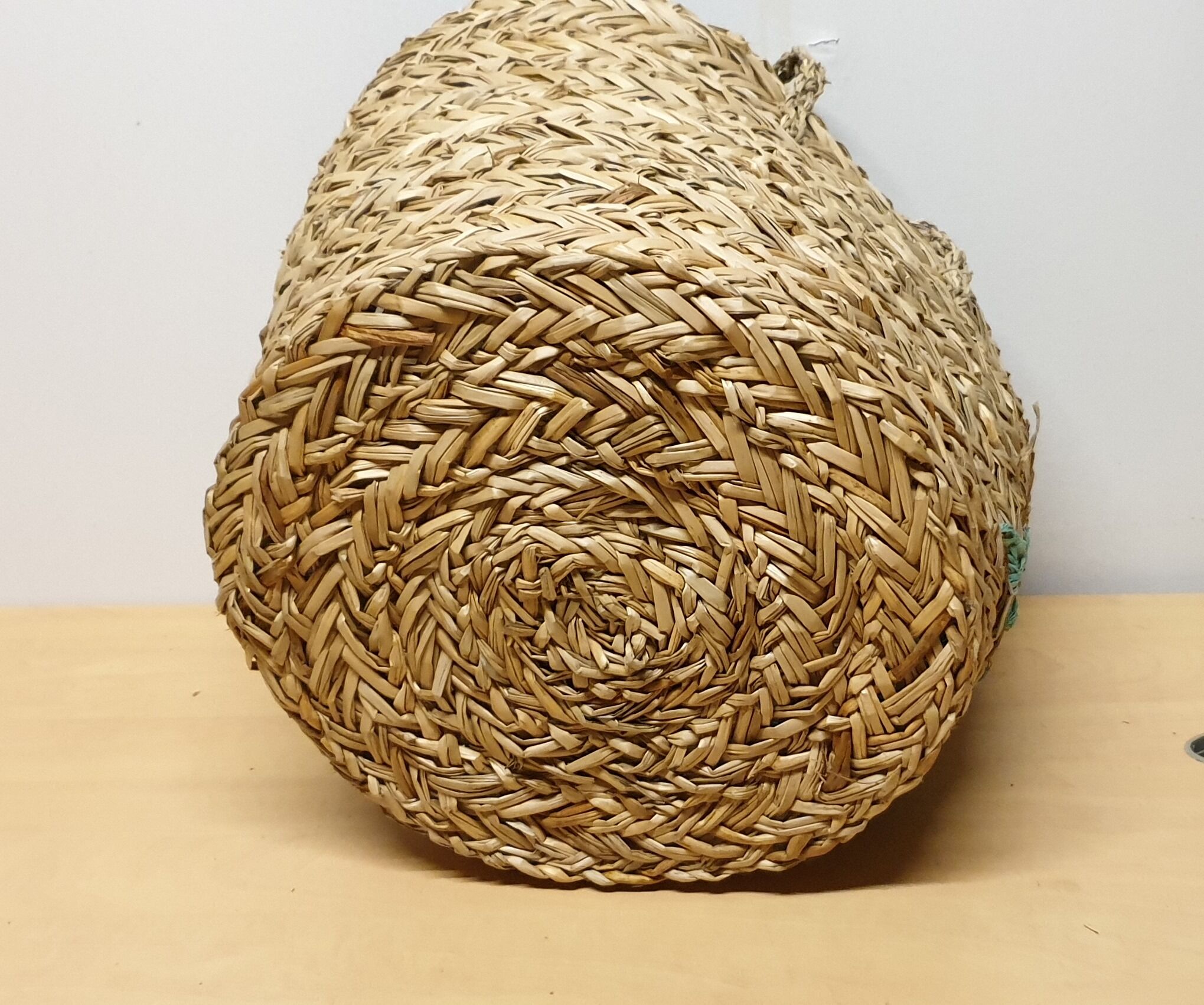 Seventies braided straw basket