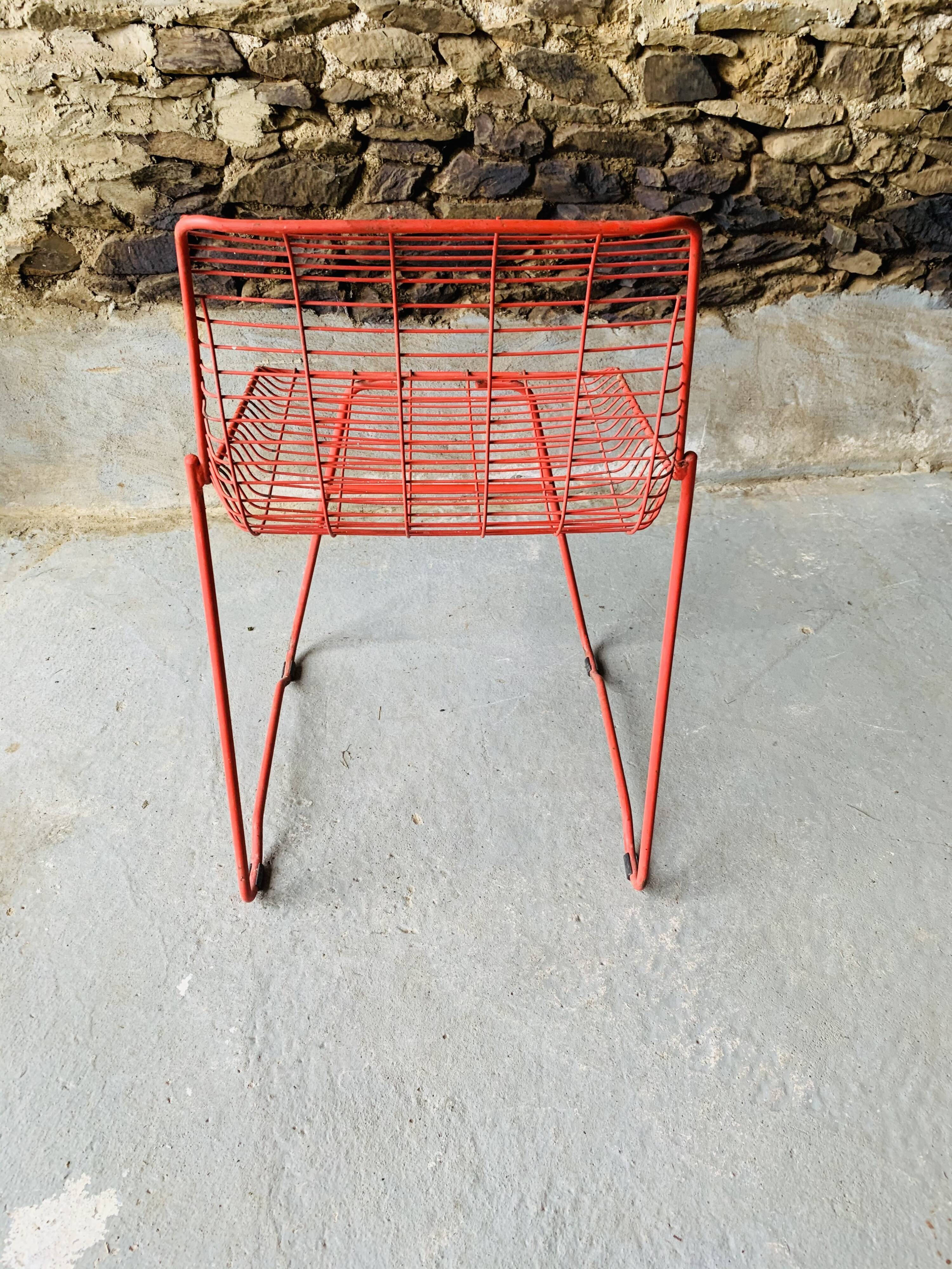 4 red design chairs