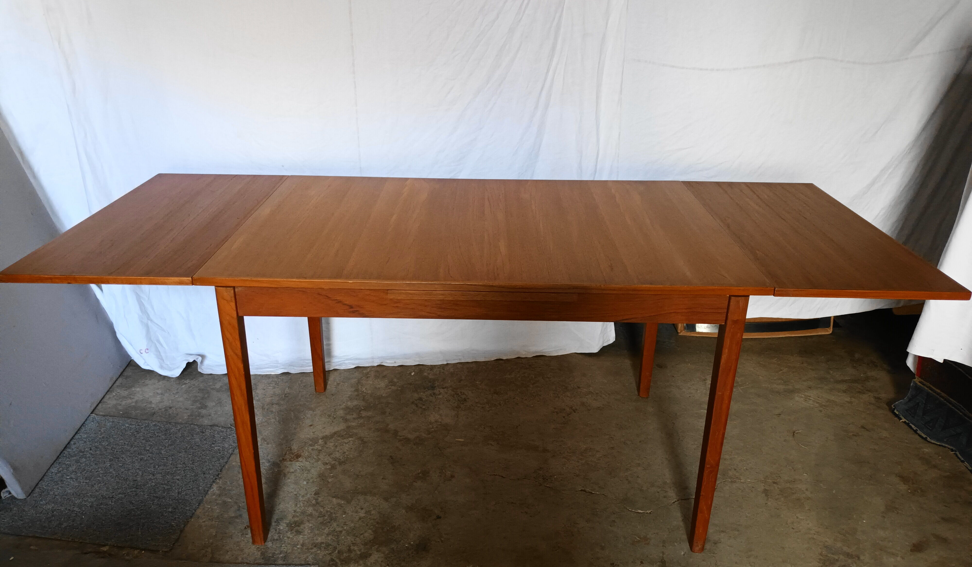 Scandinavian teak extension table from the 60s