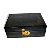 Vintage jewelry box in black leather and red interior