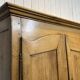 19th-century country wardrobe in blonde chestnut.