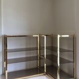 Pair of consoles brass shelves and smoked glass design Roche Bobois