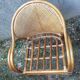 Fauteuil bas en rotin et bambou dossier canné vintage