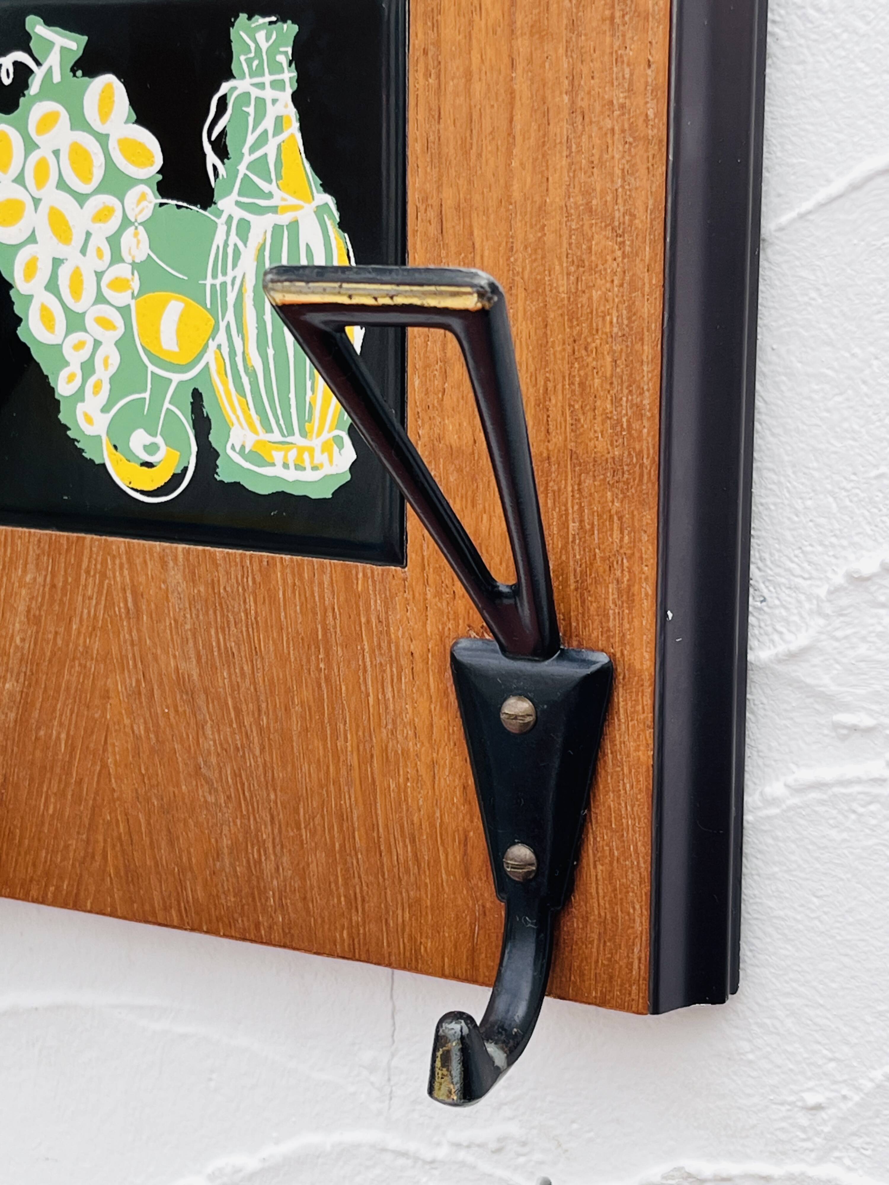Vintage wooden wall coat rack mirror from the 1960s.