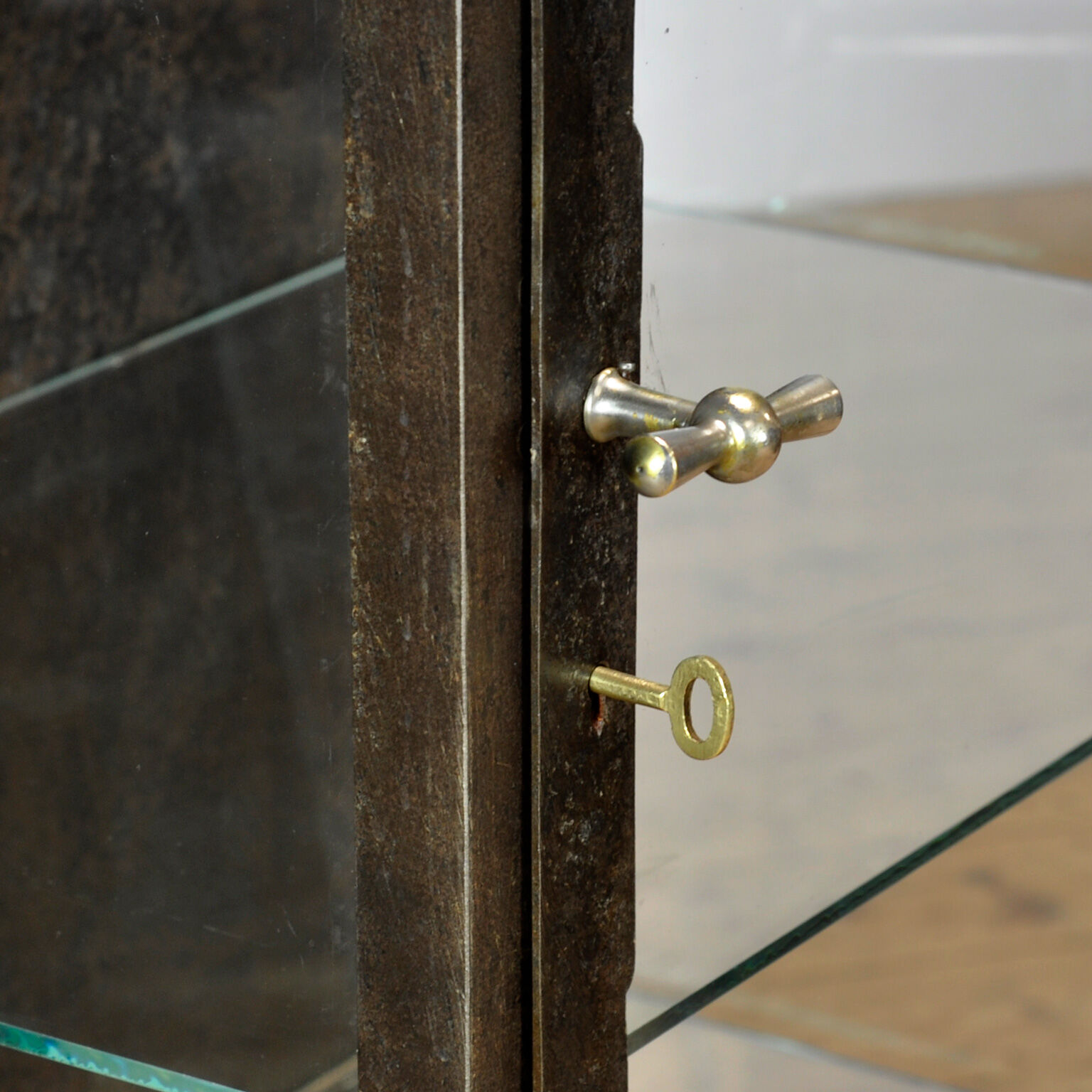 Polished iron medical cabinet, 1910s