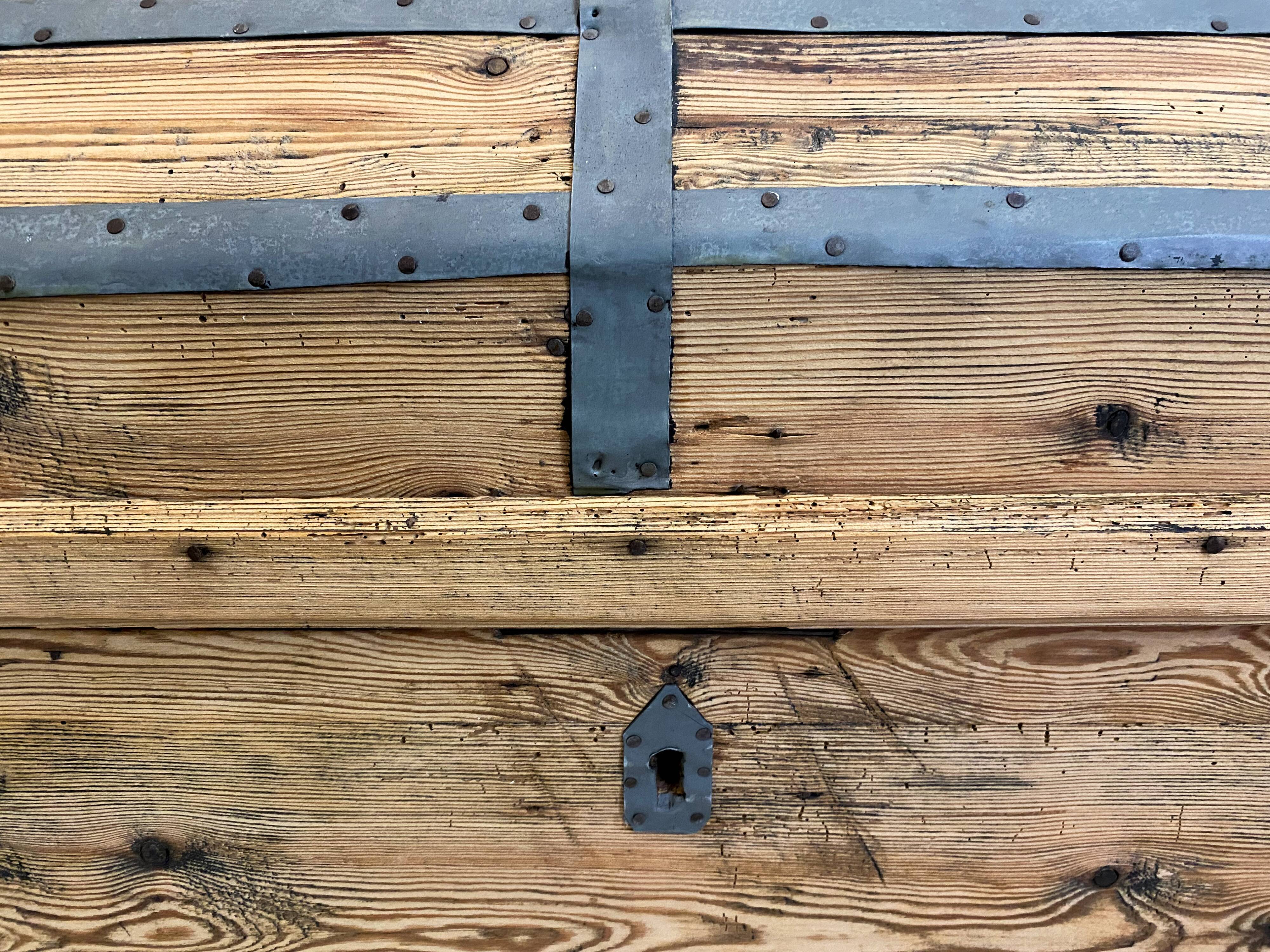 Old trunk restored in wood and zinc rounded top