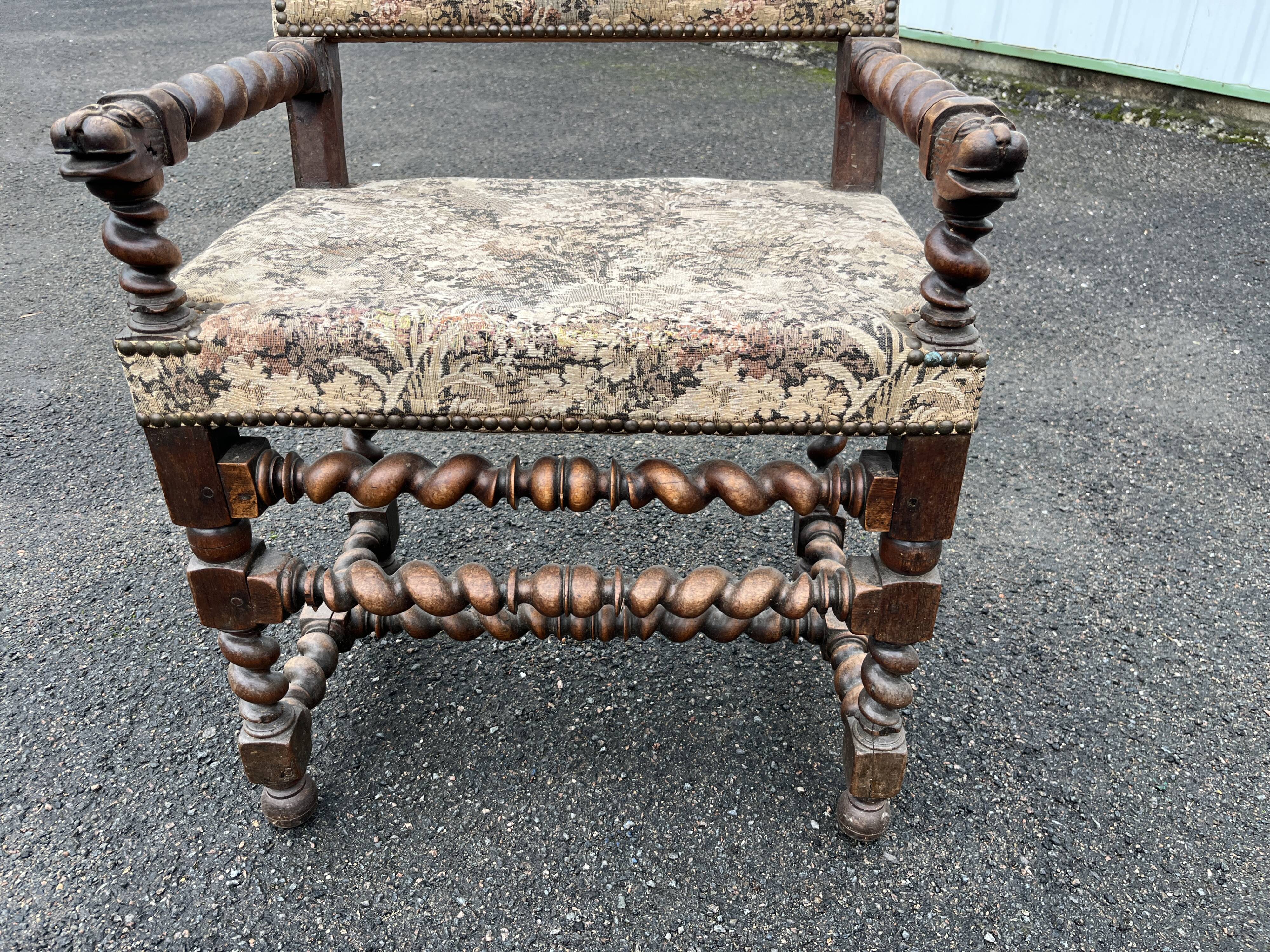 Louis XIII style armchair with twisted backrest and legs.