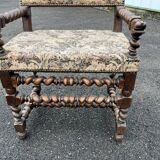Louis XIII style armchair with twisted backrest and legs.