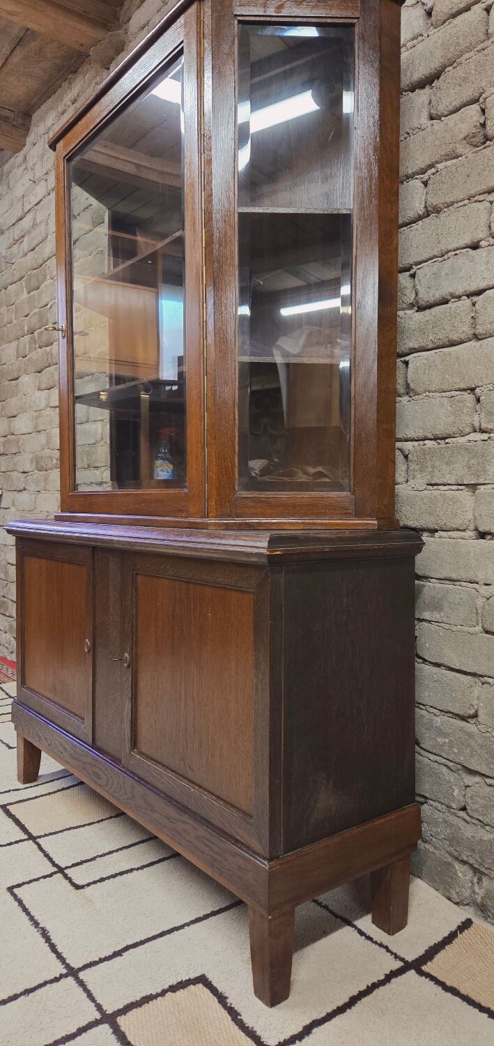 Vintage two-body display cabinet in oak from the 1950s.