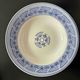 Set of 9 vintage deep plates with blue patterns.