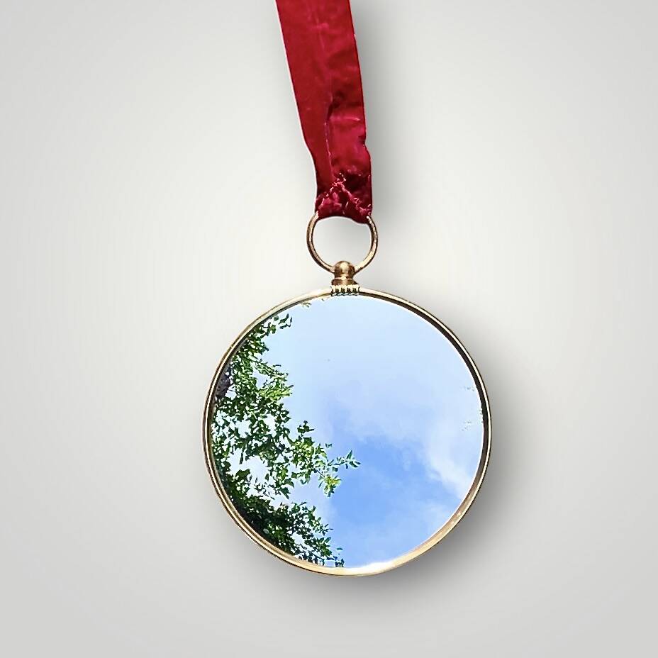 Antique convex "witch's eye" mirror