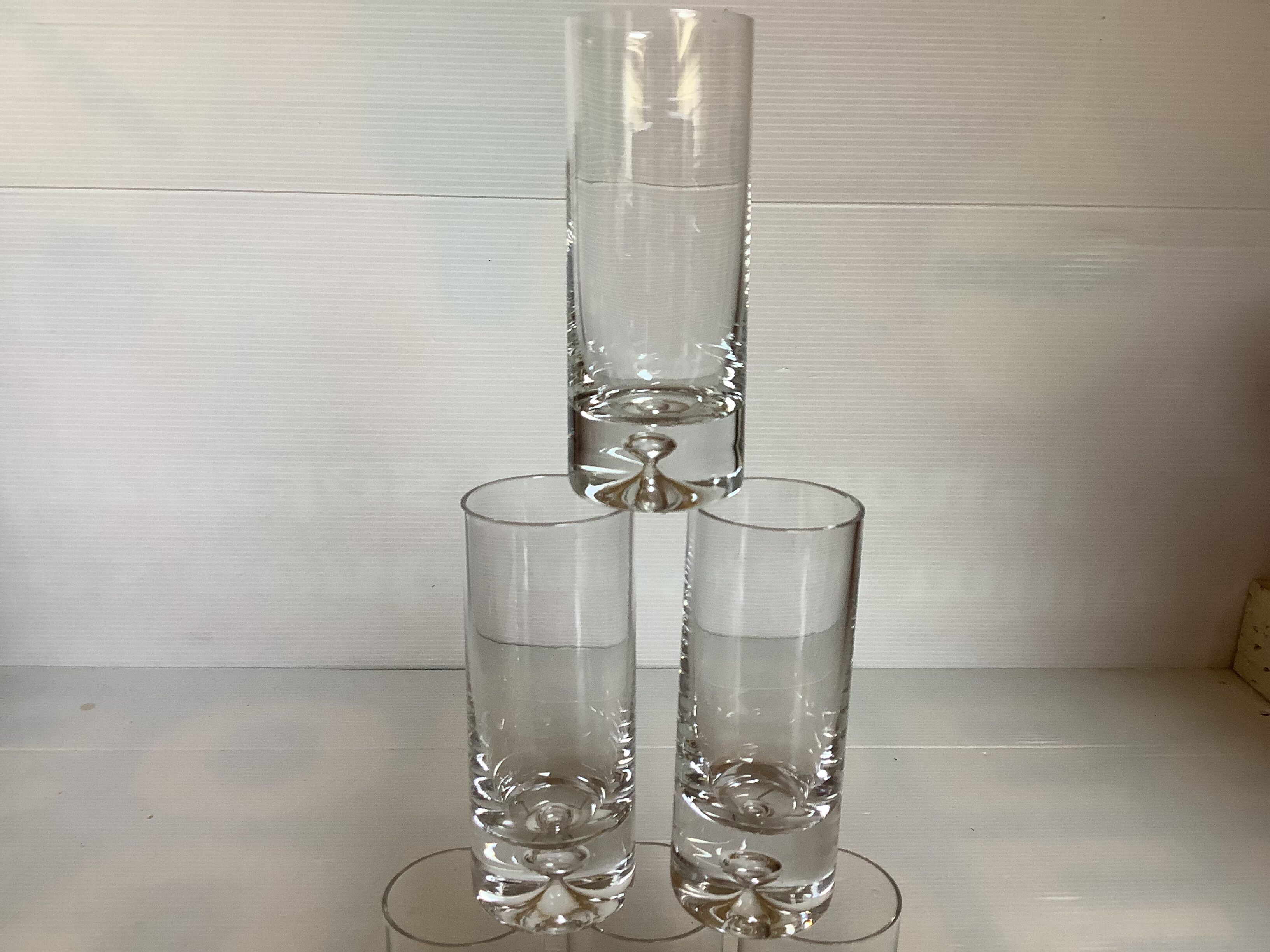 6 small bubble-footed shot glasses in Kosta Boda style.