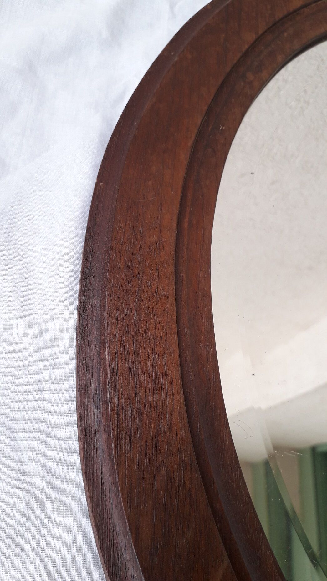 Oval wooden mirror