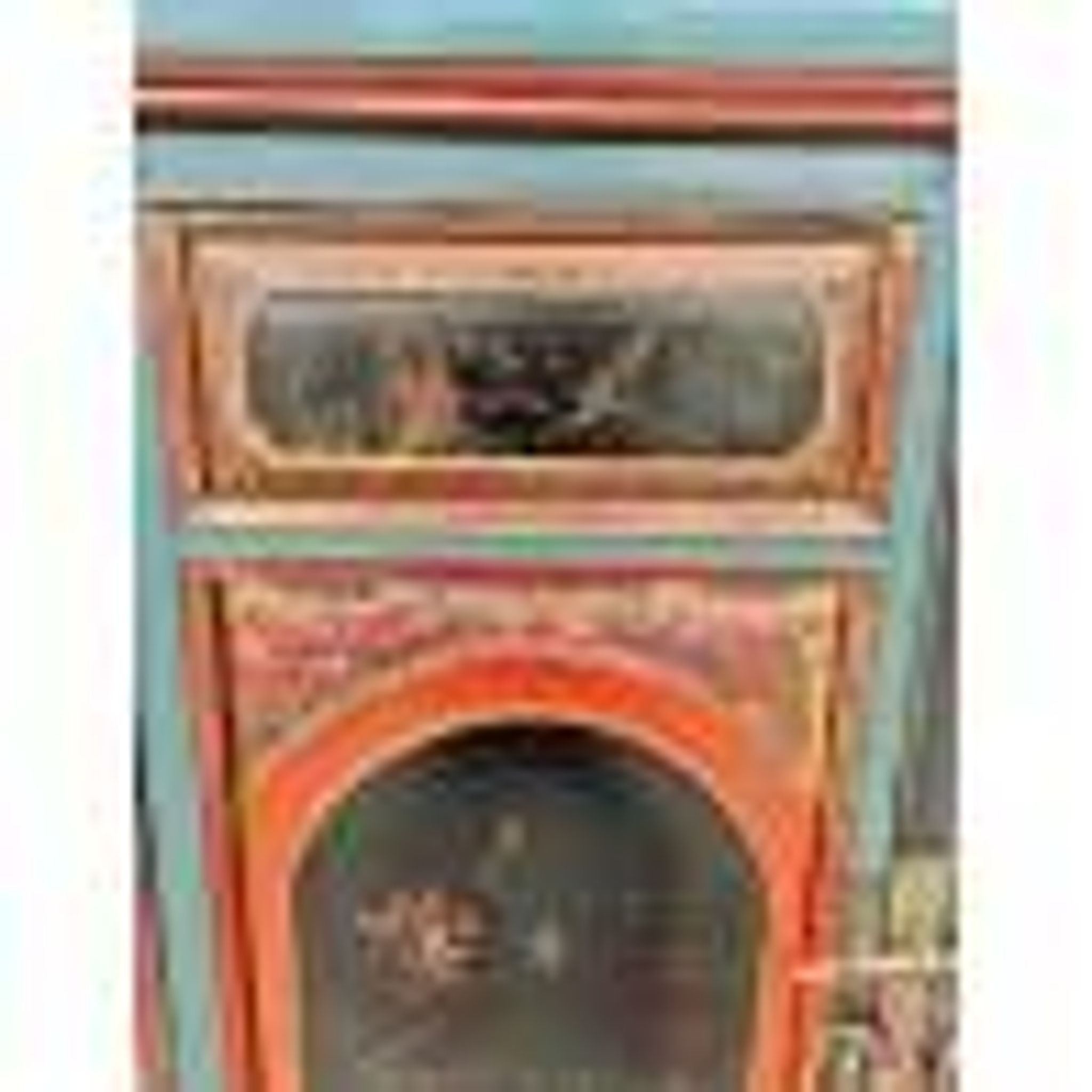 Restored antique Vietnamese wardrobe with care.