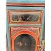 Restored antique Vietnamese wardrobe with care.