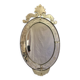 Oval Venetian mirror with close-bezel, early 20th century, flower decoration