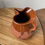 Glazed earthenware jug