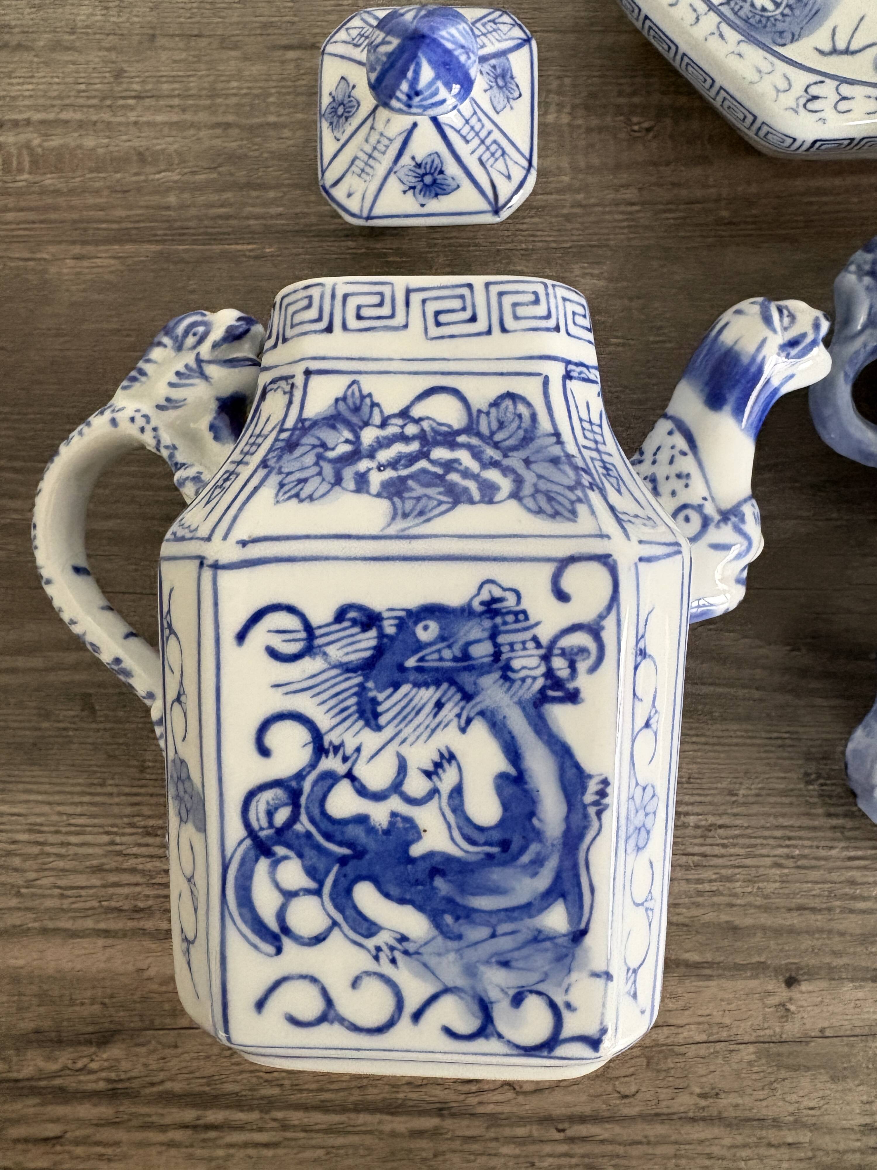 Antique Chinese tea set decorated with dragons.