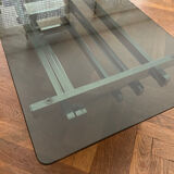 70s design coffee table in rectangular glass with chrome legs.