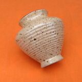 Glazed ceramic spinning top vase with speckled decor