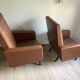 Paire de fauteuils en skai marron vintage annees 50