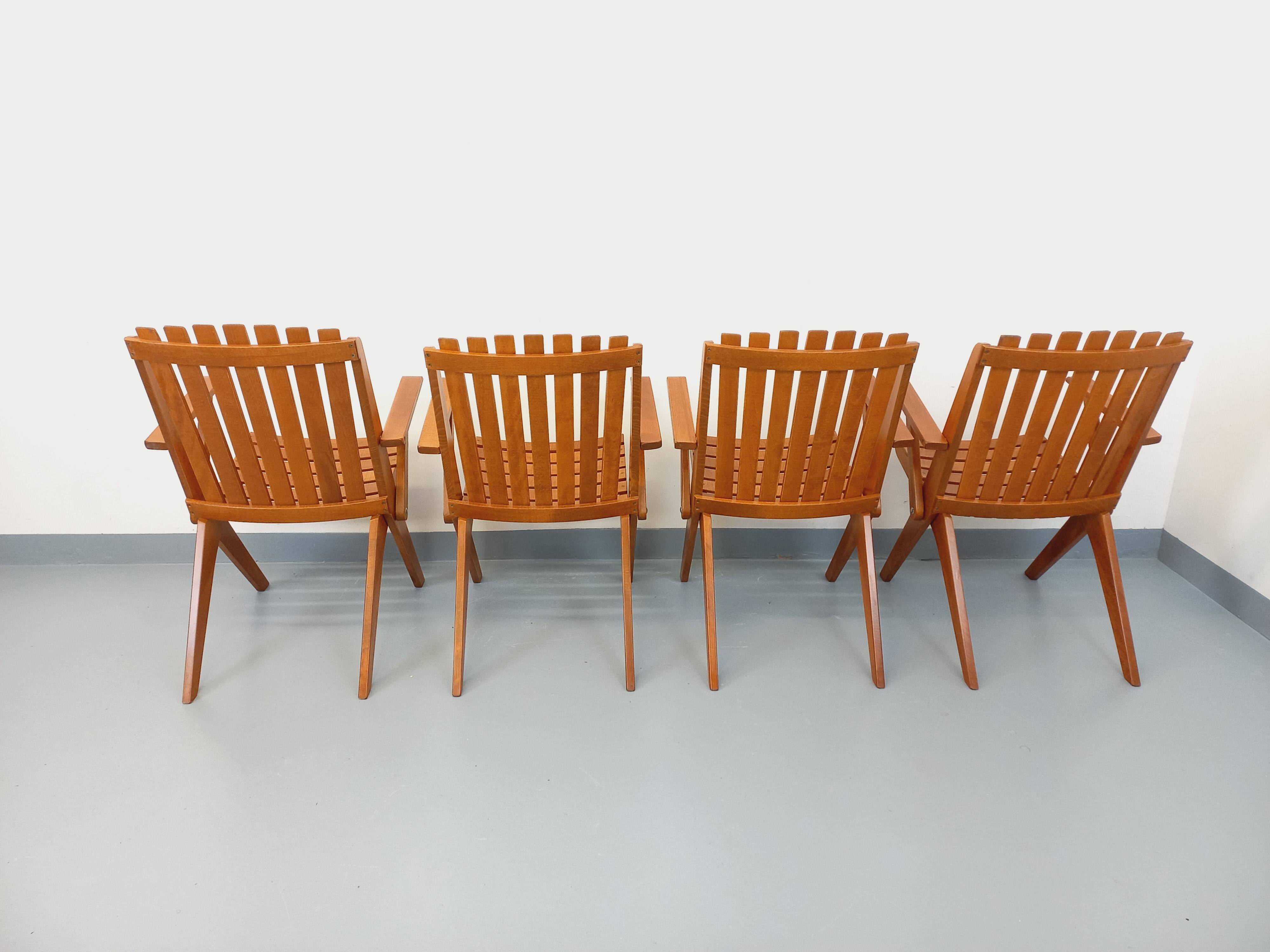 Set of 4 vintage garden chairs made of beech wood from the 1960s.