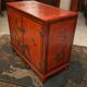 Low sideboard with lacquered decoration with birds on orange background Far East China Japan