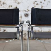 Pair of Bauhaus cantilever armchairs in chromed metal and leather, 1970