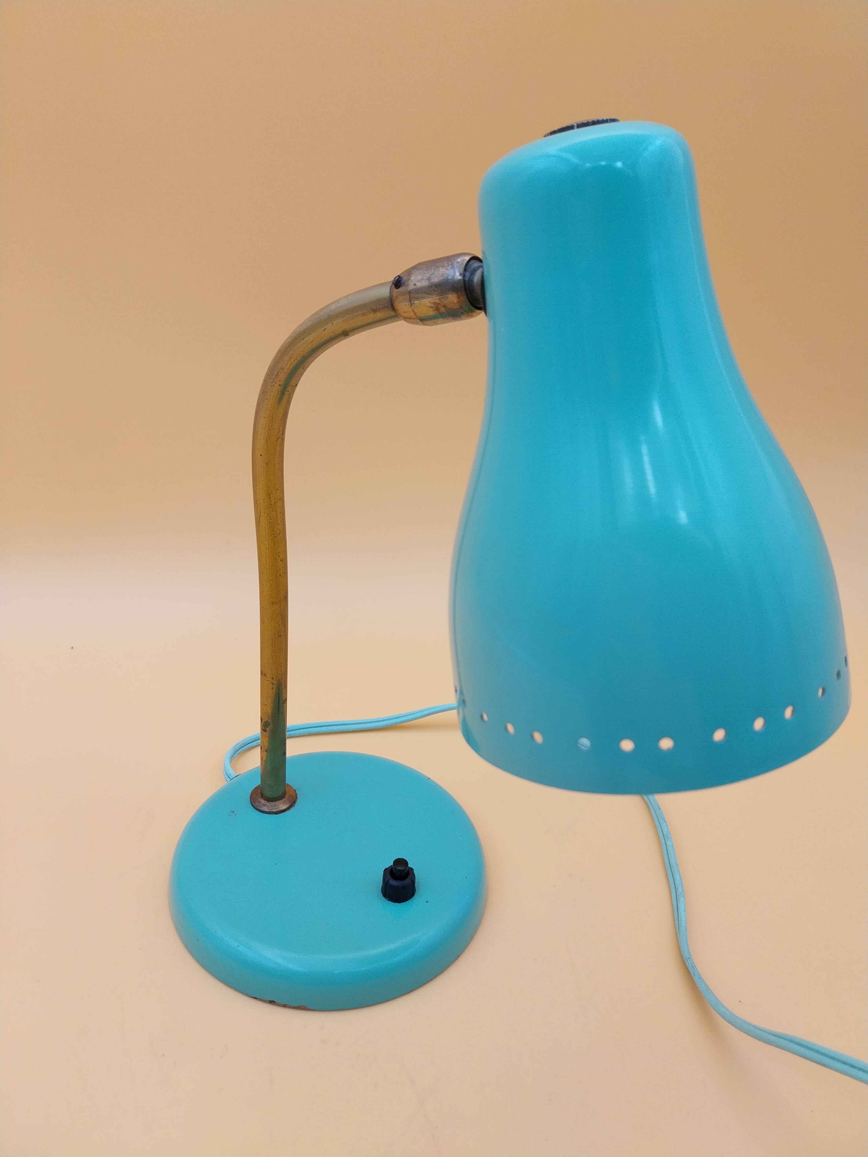 Green brass desk lamp with a goose neck on a ball joint from the 1960s.