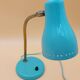 Green brass desk lamp with a goose neck on a ball joint from the 1960s.