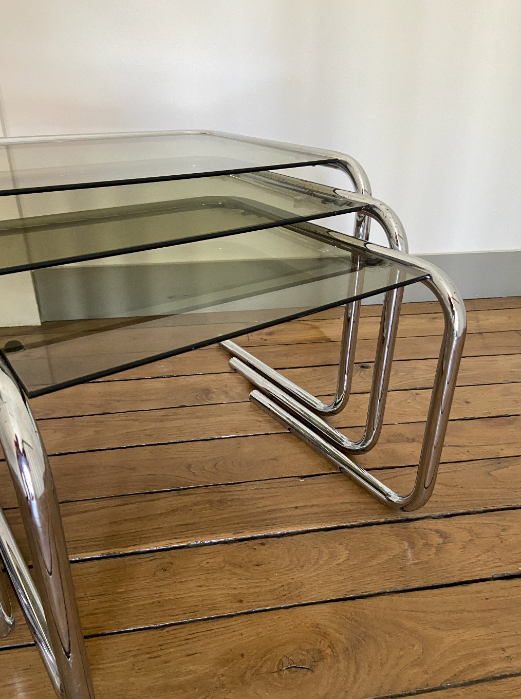 Vintage chrome trundle tables and smoked glasses 1970