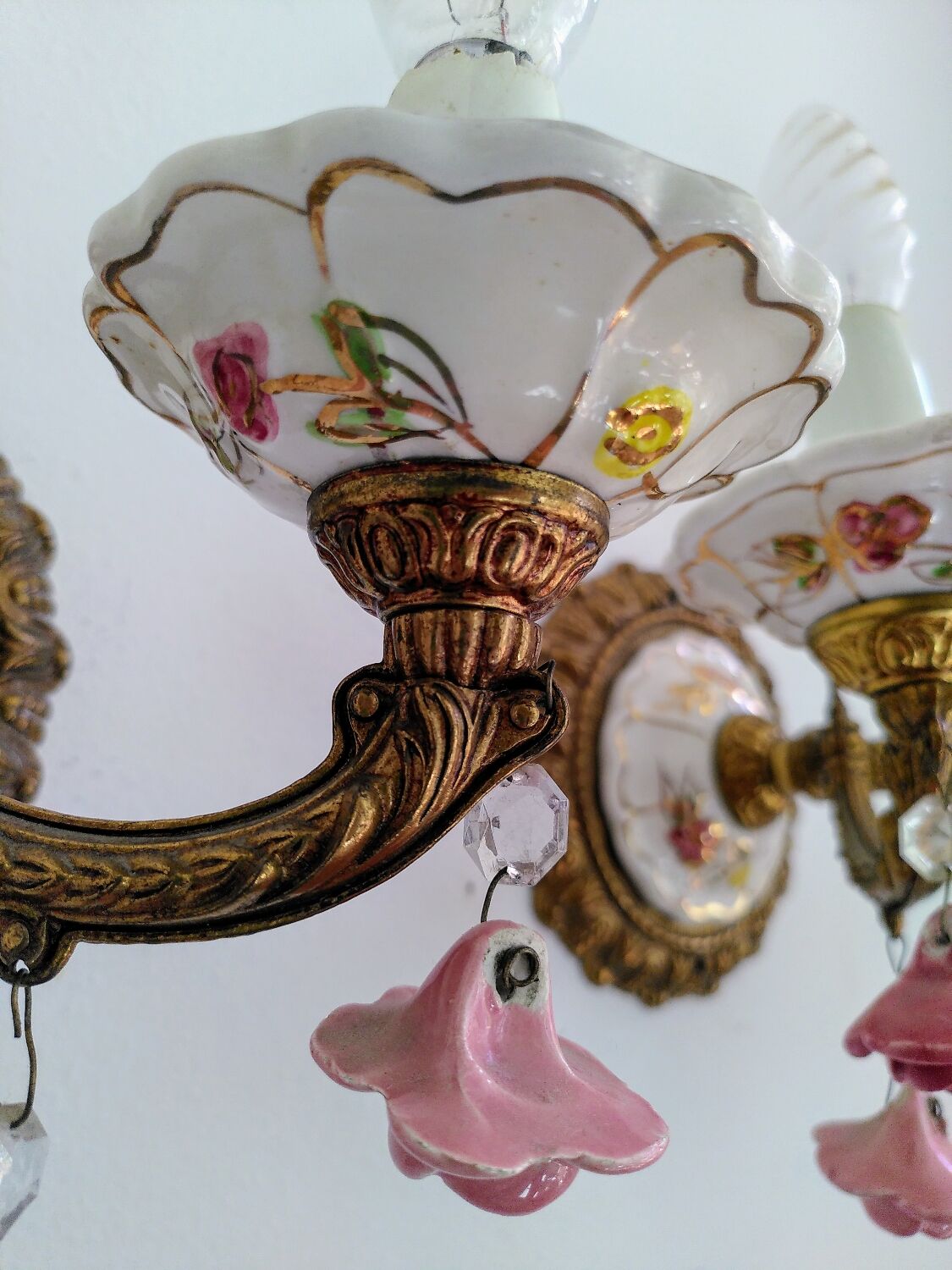 Pair of brass and porcelain wall lights