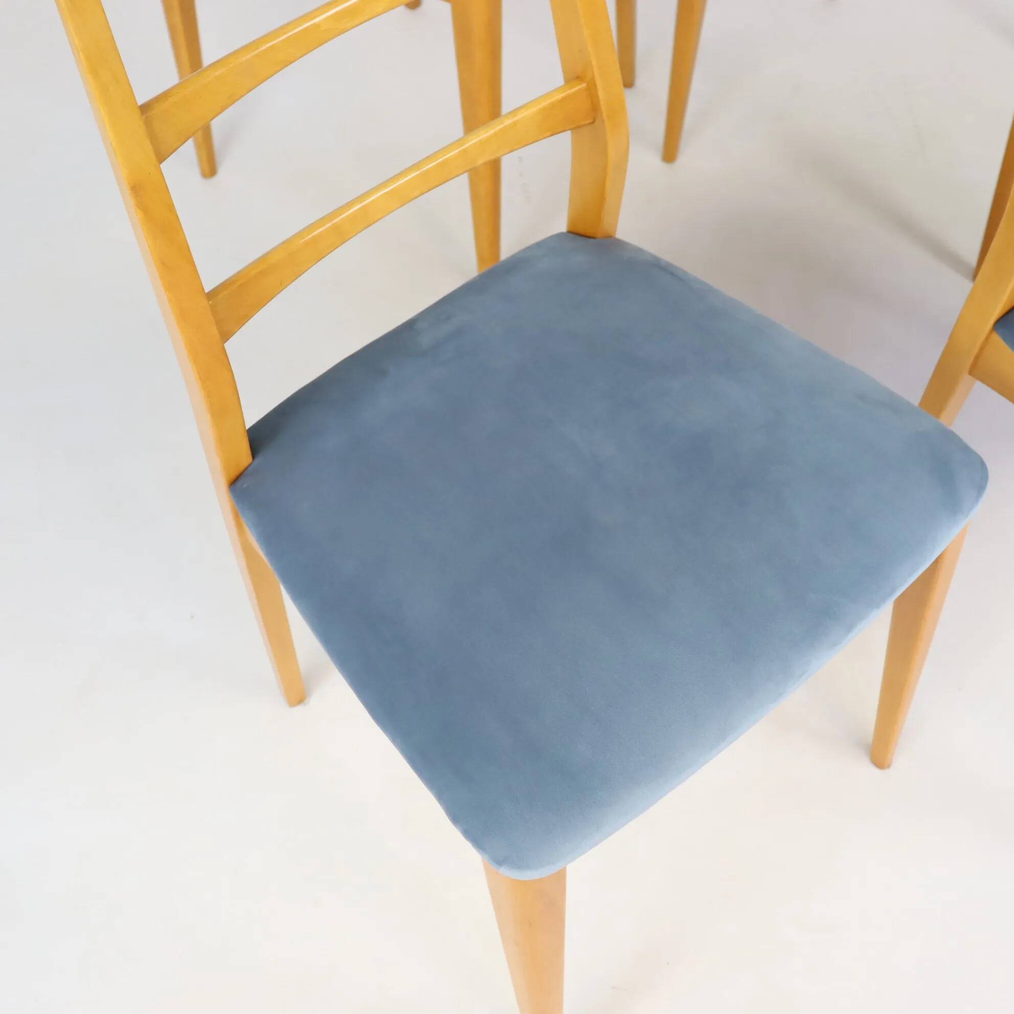 Set of four blue velvet Scandinavian chairs.
